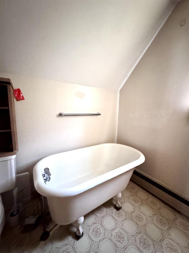 14 Summer St, Northumberland, NH 03582 - bathroom featuring a soaking tub and lofted ceiling