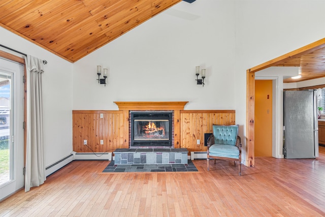 living room with a baseboard heating unit, wood ceiling, high vaulted ceiling, hardwood / wood-style floors, and a fireplace