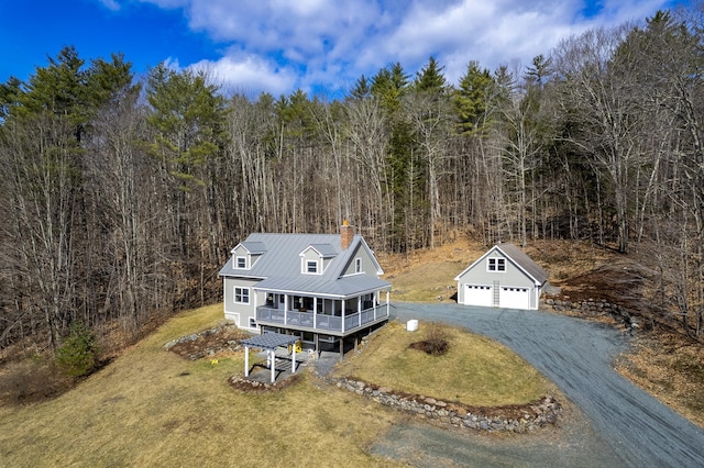 bird's eye view featuring a forest view