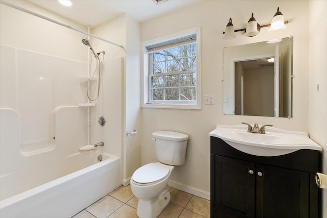 full bath with toilet, baseboards, tile patterned flooring, vanity, and shower / tub combination