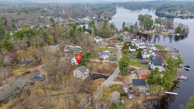 birds eye view of property featuring a residential view and a water view