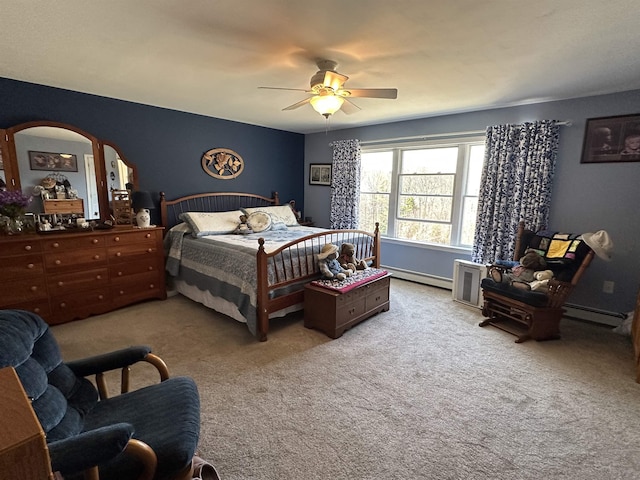 carpeted bedroom with baseboard heating, arched walkways, and a ceiling fan