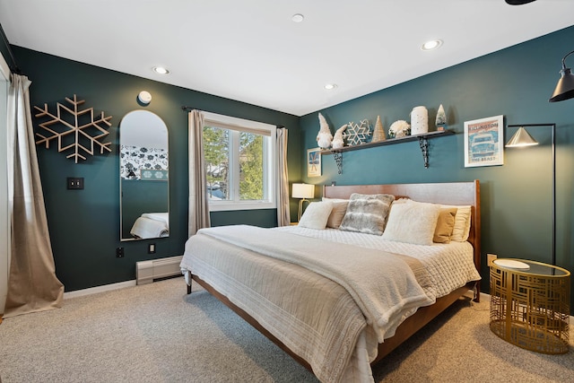carpeted bedroom featuring baseboard heating, baseboards, and recessed lighting