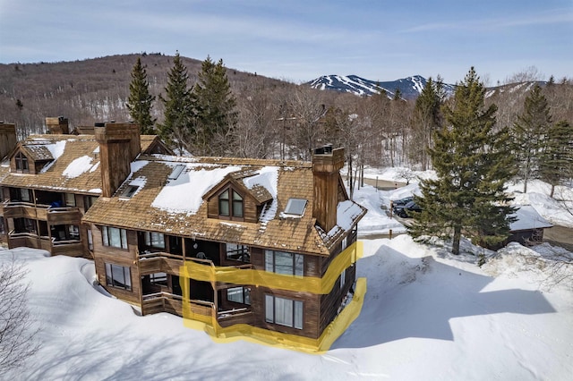 exterior space featuring a mountain view