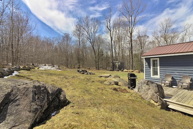 view of yard featuring a deck