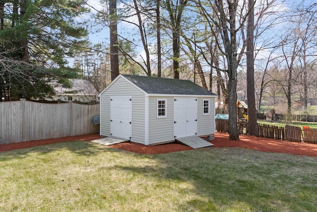 view of shed featuring a fenced backyard