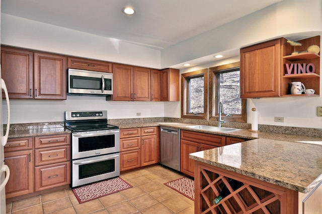 78 Coopers Trce, Plymouth, VT 05056 - kitchen with brown cabinets, appliances with stainless steel finishes, and a sink