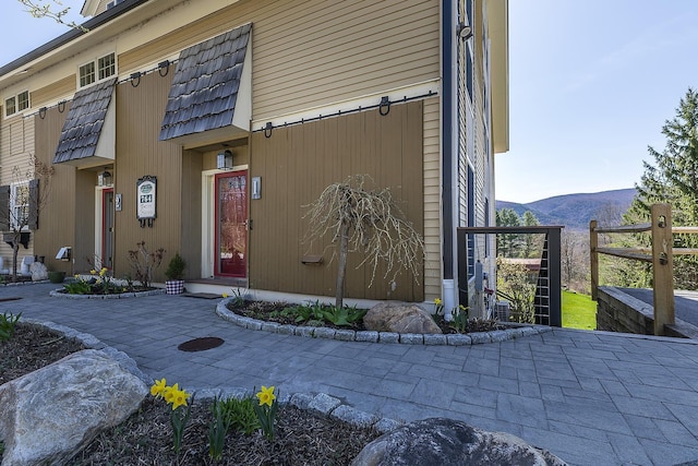 property entrance with a mountain view
