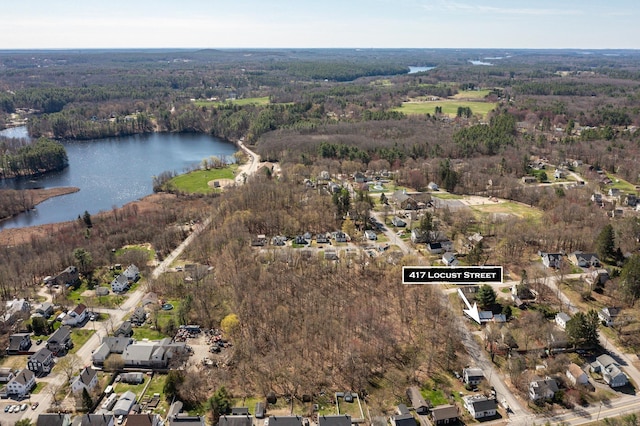 417 Locust St, Rollinsford, NH 03869 - aerial view of property and surrounding area with a nearby body of water and a heavily wooded area