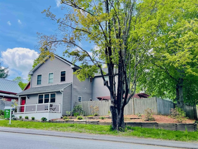 417 Locust St, Rollinsford, NH 03869 - view of front of house with fence