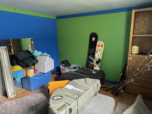 bedroom with wood finished floors