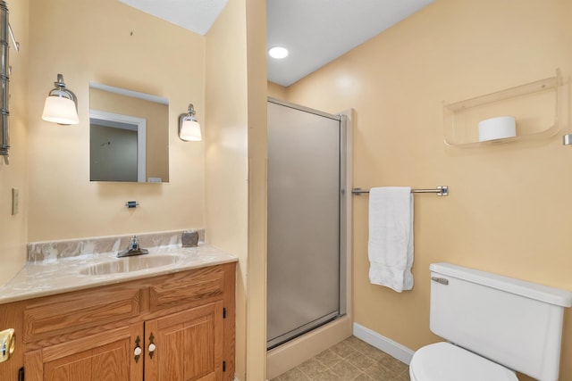 full bath featuring tile patterned floors, toilet, a shower stall, and baseboards