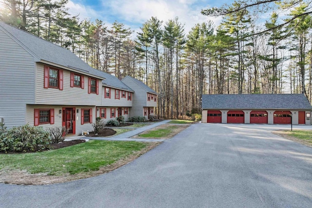 exterior space with aphalt driveway