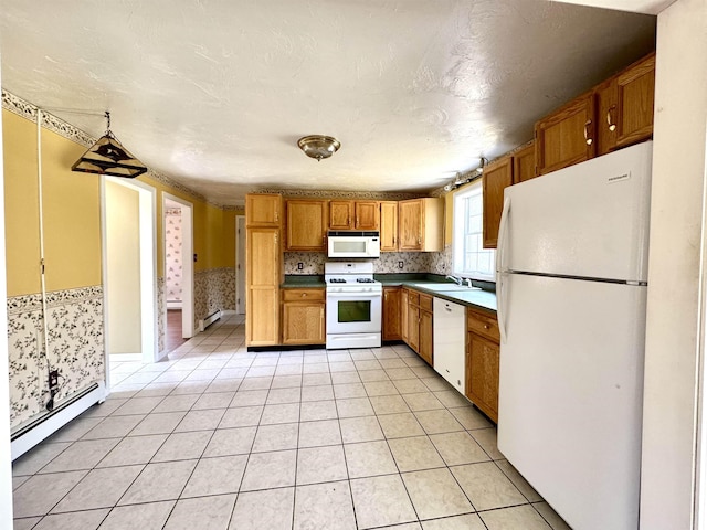 207 Blakely Farm Rd, Colebrook, NH 03576 - kitchen featuring light tile patterned floors, a sink, baseboard heating, and white appliances