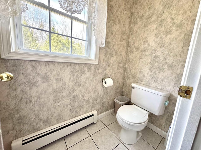 207 Blakely Farm Rd, Colebrook, NH 03576 - bathroom featuring baseboards, toilet, baseboard heating, and a healthy amount of sunlight