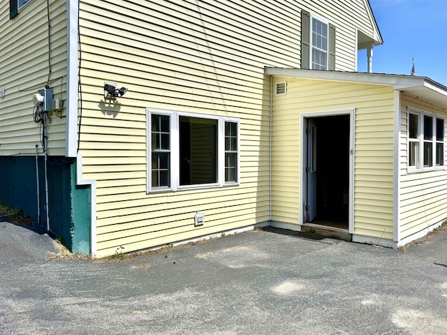 207 Blakely Farm Rd, Colebrook, NH 03576 - view of exterior entry featuring a patio area