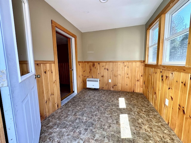 207 Blakely Farm Rd, Colebrook, NH 03576 - unfurnished room featuring wooden walls and a wainscoted wall
