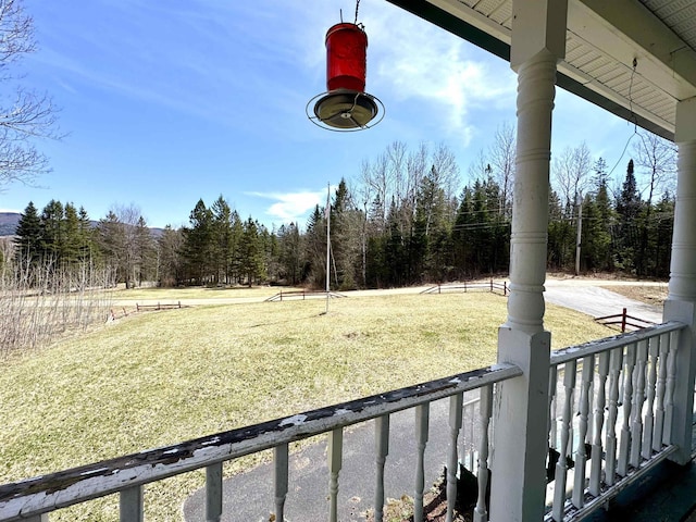 207 Blakely Farm Rd, Colebrook, NH 03576 - view of yard featuring covered porch and a forest view