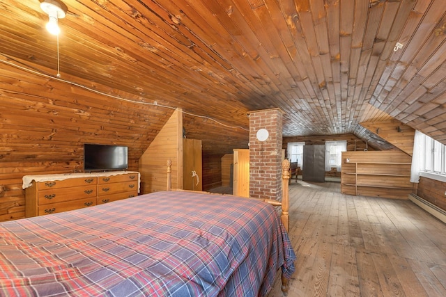 bedroom with wooden walls, wooden ceiling, vaulted ceiling, and wood-type flooring
