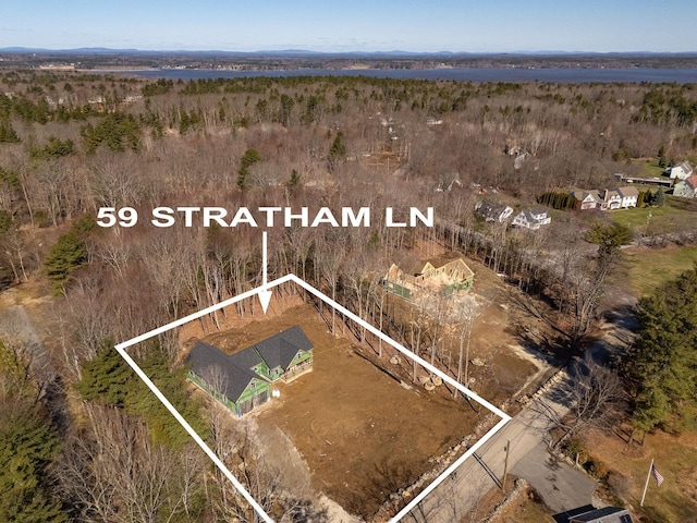 birds eye view of property with a rural view