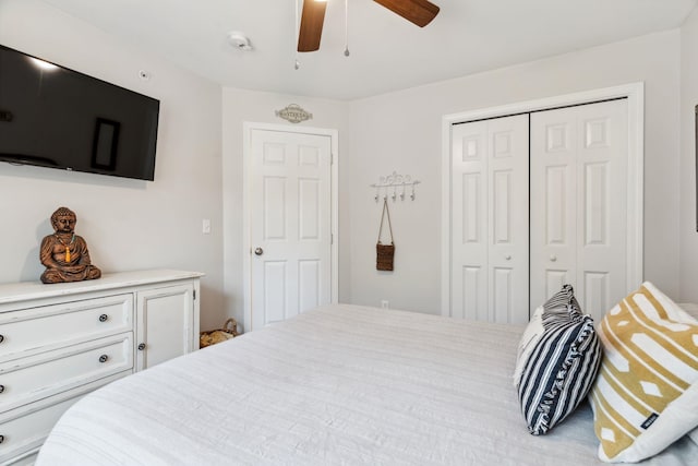 bedroom featuring a ceiling fan and a closet