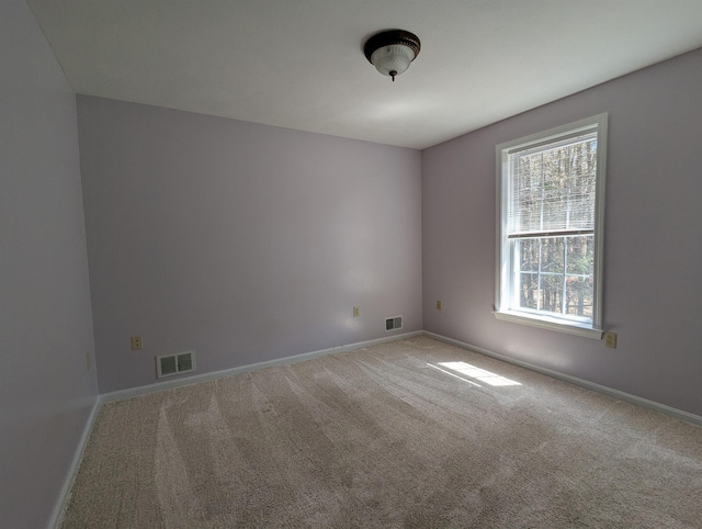 4 Sheridan Dr, Londonderry, NH 03053 - carpeted empty room featuring baseboards