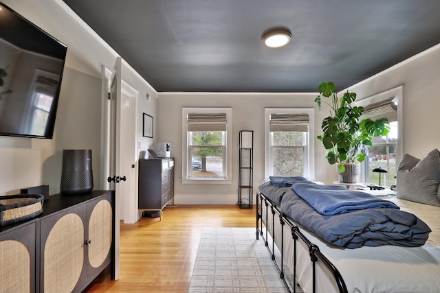 bedroom with light wood-style flooring
