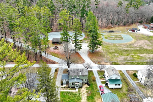 aerial view with a wooded view