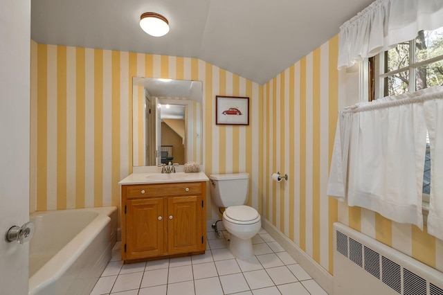bathroom featuring radiator, toilet, baseboards, tile patterned flooring, and lofted ceiling