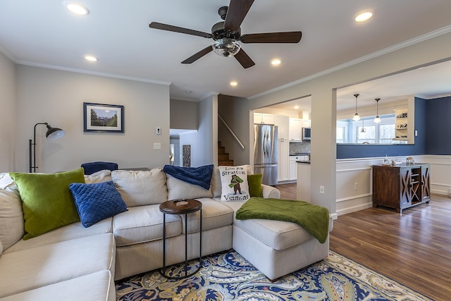 living area featuring recessed lighting, stairs, ceiling fan, and dark wood-type flooring