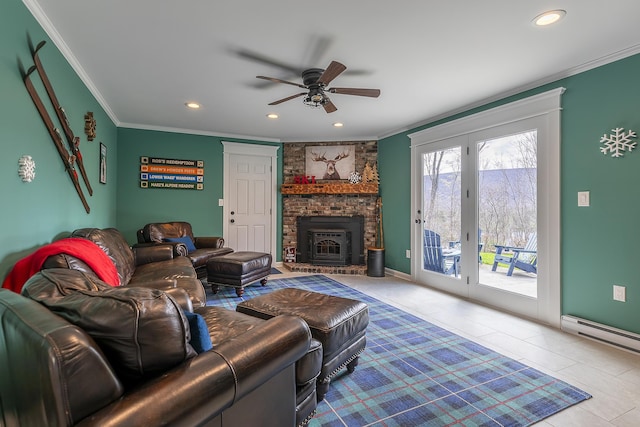 living area with tile patterned floors, a ceiling fan, ornamental molding, and recessed lighting
