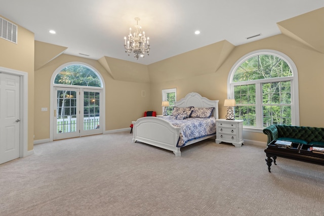 carpeted bedroom featuring a chandelier, visible vents, baseboards, and vaulted ceiling