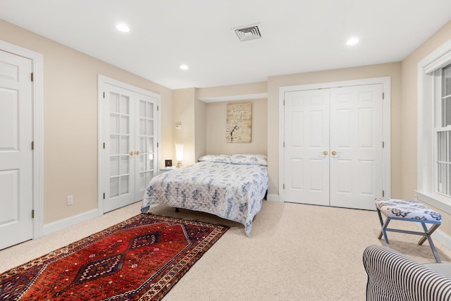 carpeted bedroom featuring visible vents, french doors, recessed lighting, and baseboards