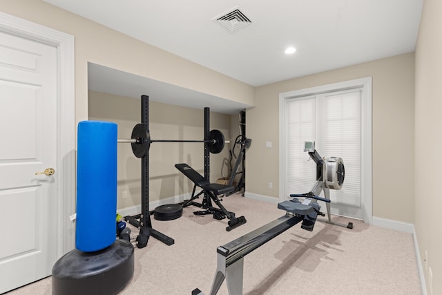 exercise area featuring baseboards, visible vents, carpet flooring, and recessed lighting