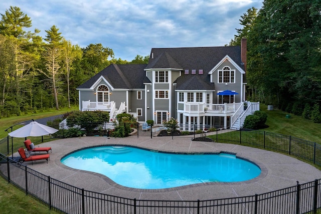 back of house featuring a patio, a deck, stairway, and fence