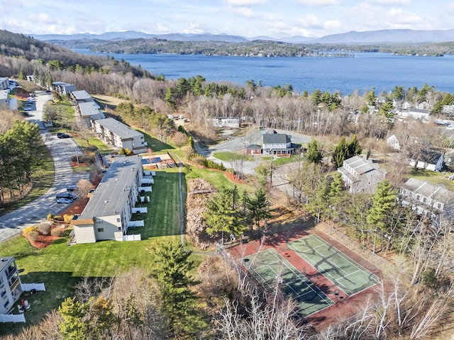 birds eye view of property featuring a water and mountain view