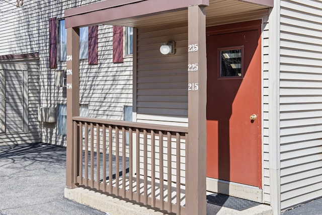 doorway to property featuring a porch