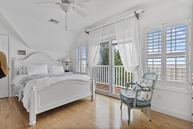 46A River St Unit A, Seabrook, NH 03874 - bedroom featuring visible vents, hardwood / wood-style floors, baseboards, vaulted ceiling, and access to outside