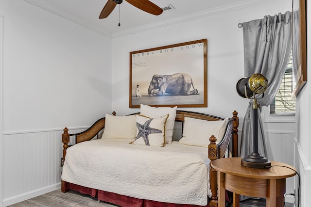 46A River St Unit A, Seabrook, NH 03874 - bedroom featuring wood finished floors, wainscoting, baseboards, visible vents, and crown molding