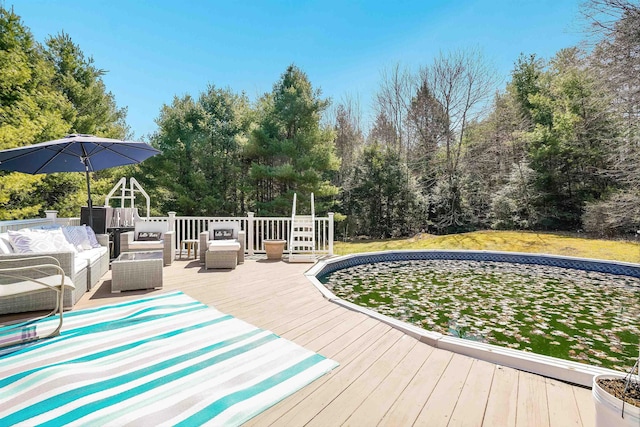 deck with an outdoor hangout area