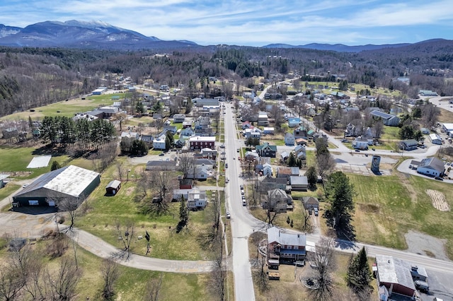 aerial view with a mountain view and a residential view
