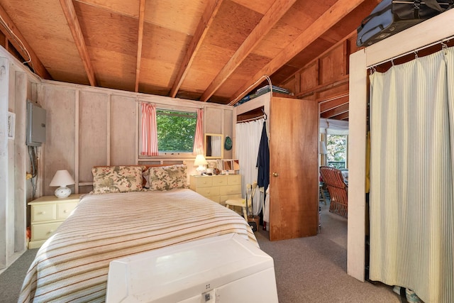 bedroom with vaulted ceiling and carpet floors
