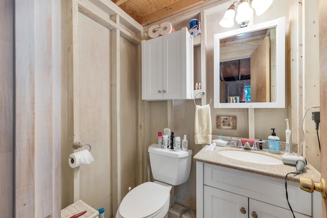 half bath with vanity and toilet