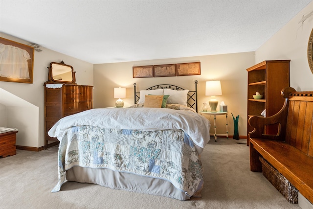 bedroom with light carpet and baseboards