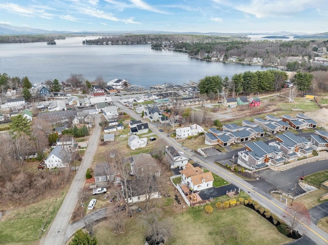 birds eye view of property with a residential view and a water view