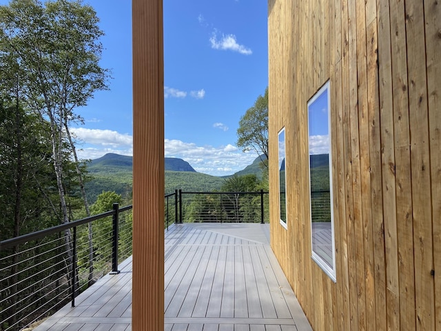 wooden terrace featuring a mountain view