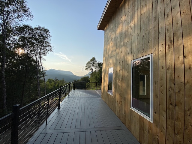 wooden terrace with a mountain view