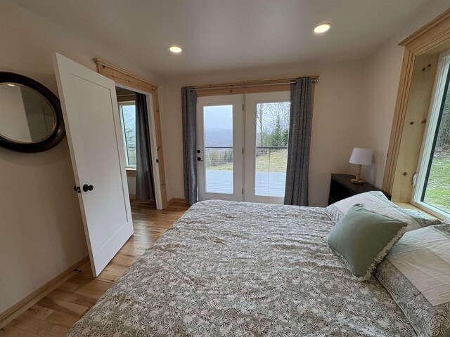 bedroom featuring recessed lighting, access to exterior, baseboards, and light wood-style floors