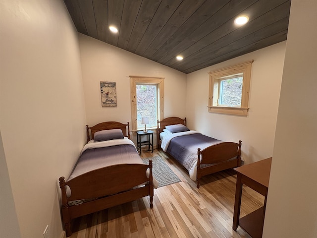 bedroom with wooden ceiling, recessed lighting, light wood finished floors, and vaulted ceiling