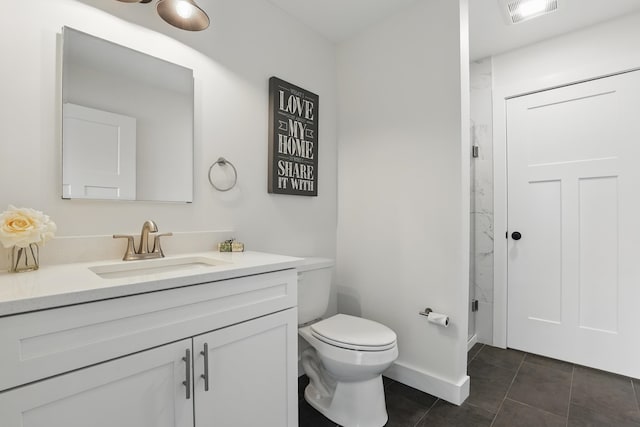 full bathroom with tile patterned flooring, toilet, vanity, baseboards, and visible vents